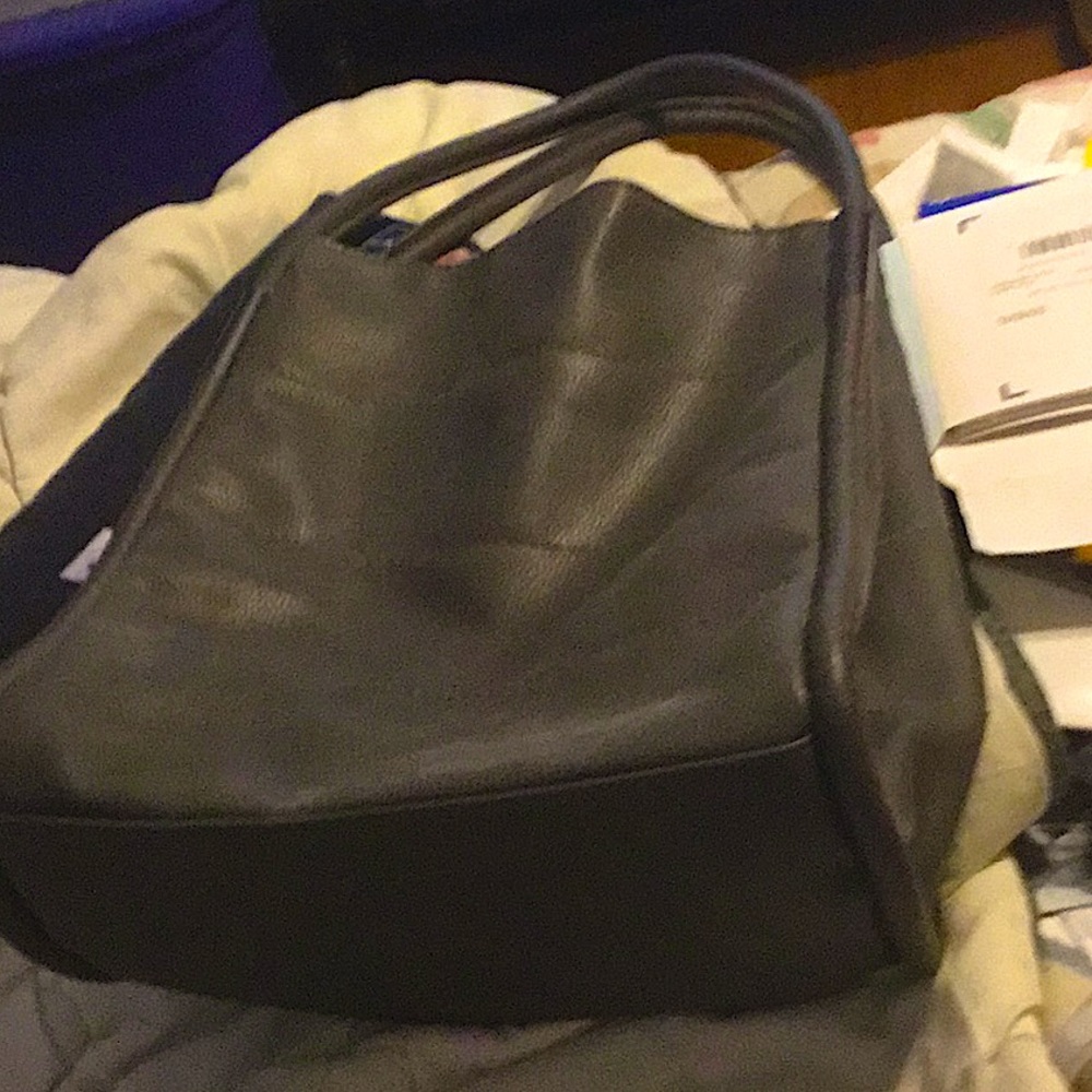 Newman Marcus.dark gray 12 by 12 leather tote.carry on shoulder or in hand.Sharp